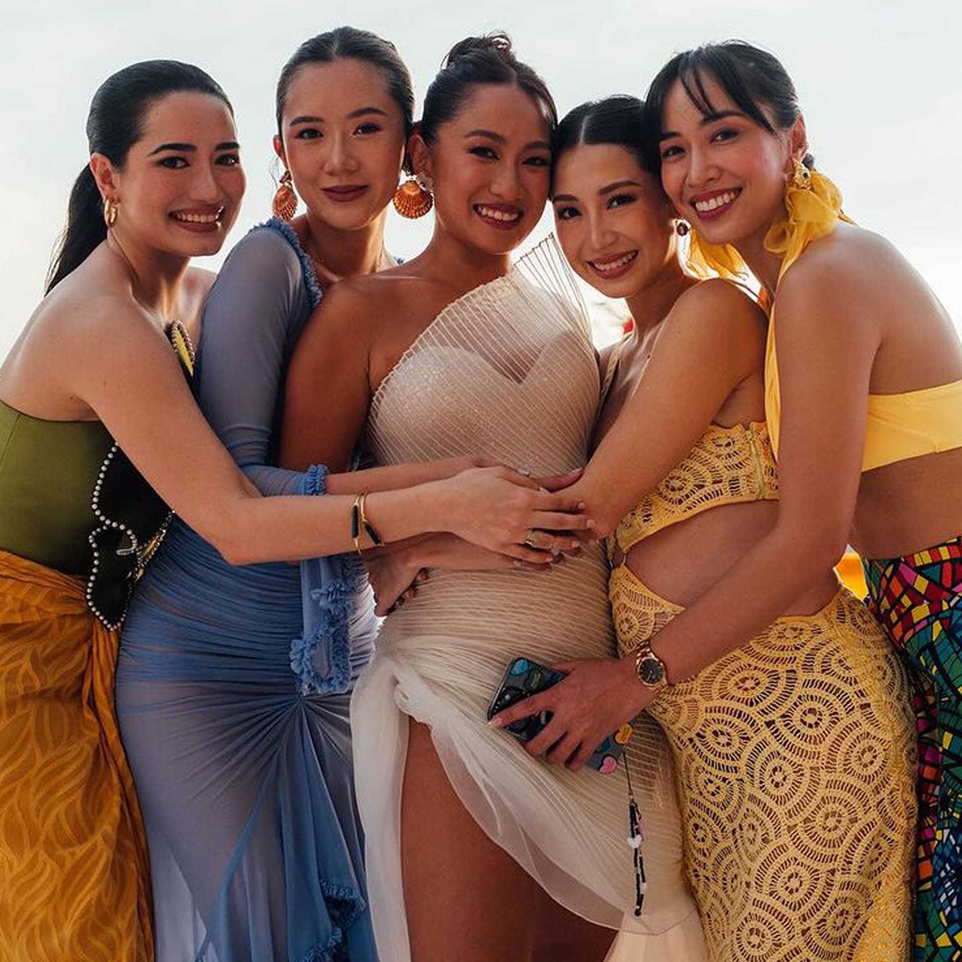 Laureen Uy Miggy Cruz weddings guests Palawan destination fashion style maximalist colors prints beach wedding blogger besties Kryz Uy Camille Co Nicole Andersson Lissa Kahayon reunite reunion