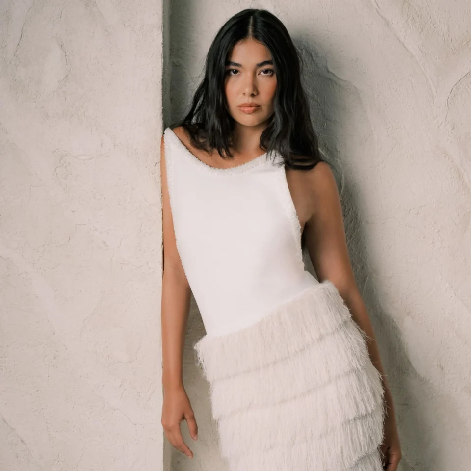 Inigo Villegas resort 2025 Filipino fashion embellishments decorative detail Avant-garde Womenswear evolution white dress Pam printster